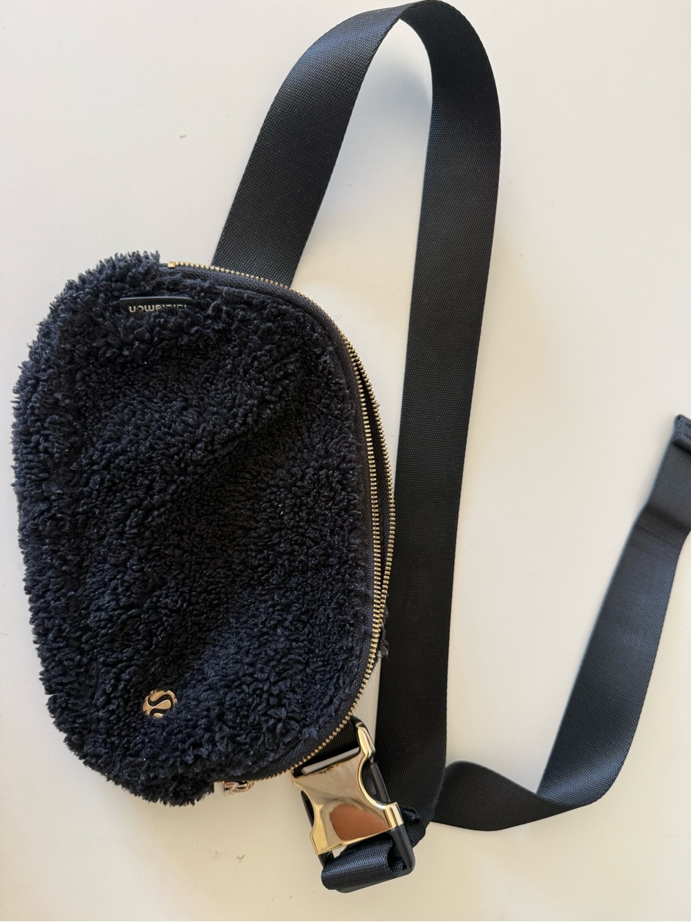 Lululemon Black Sherpa Crossbody Sling with Gold Accent